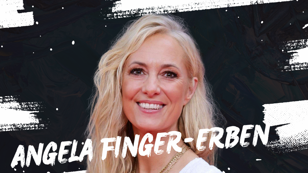 Angela Finger-Erben bei einem öffentlichen Auftritt auf dem roten Teppich.